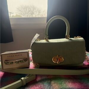 Inc. Mint Green Mini Bag with Gold Accents and a bangle to match